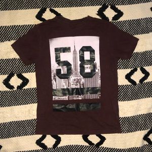 Burgundy Aeropostale shirt.